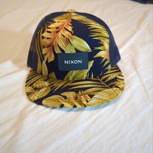 Nixon Tropics Snapback Hat, featuring a tropical floral print